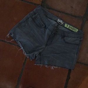 Distressed stretch fringe shorts